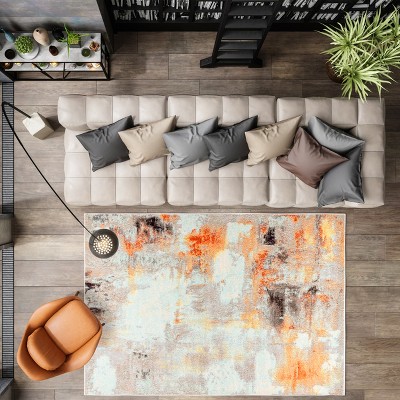 4' x 6' Blue and Orange Abstract Synthetic Area Rug