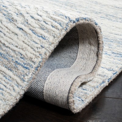 Light Blue Hand-Tufted Wool 6' x 9' Area Rug