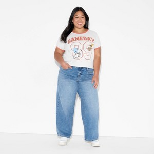 Women's Snoopy Game Day Ringer Short Sleeve Graphic Baby T-Shirt - Off-White - 1 of 3