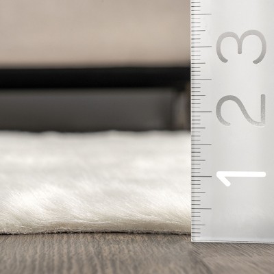 EcoChic Off-White Faux Cowhide 5' x 7' Easy-Care Area Rug