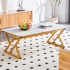 A coffee table made of rock slab material, with a smooth and natural surface that complements the modern design,making for living rooms.47*23.6 - 3 of 4