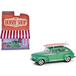 1946 Ford Fordor Super Deluxe Green Metallic with White Interior and Rack with Surfboards 1/64 Diecast Model Car by Greenlight - 1 of 3