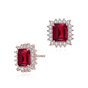 Elegant square stud earring featuring a central cubic zirconia stone surrounded by dazzling accents - 1 of 2