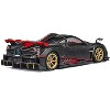 Pagani Imola Black Carbon with Italian Flag Stripes with Extra Wheels 1/64 Diecast Model Car by CM Models - 2 of 4
