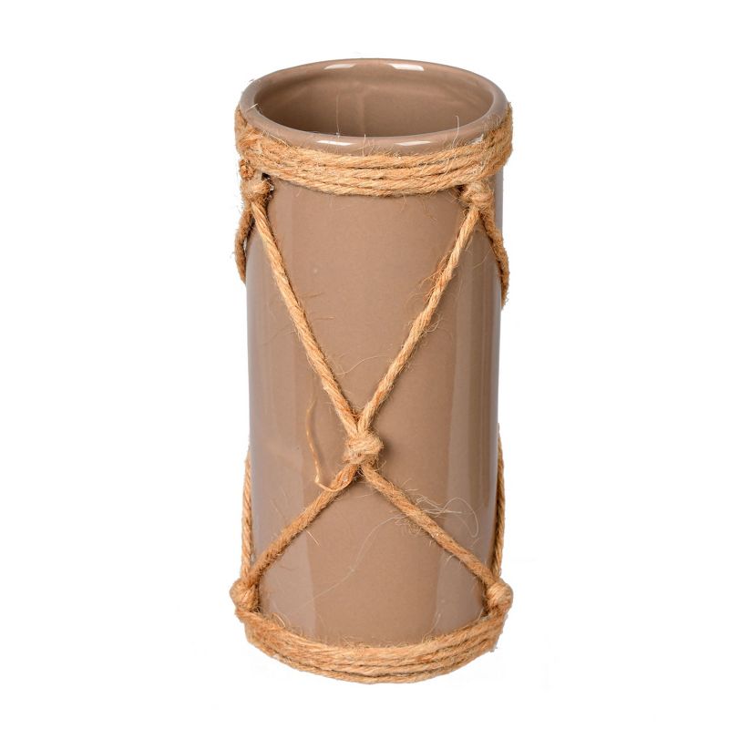 Vickerman 8" Sandstone Ceramic Vase in Jute Rope. This vase features a sturdy ceramic construction and thick jute rope hanger. It measures 8 inches, 1 of 2