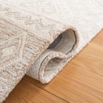 Handmade Beige and Ivory Tufted Wool Rug 2'3" x 9'