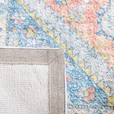 Bohemian Blue and Rust 59'' Hand Loomed Wool-Cotton Blend Rug