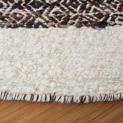 Black and Ivory Round Handwoven Wool Cotton Area Rug