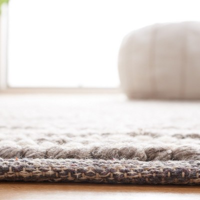 Handmade Ivory and Dark Brown Wool Accent Rug, 2' x 3'