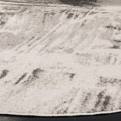 Ivory and Gray Abstract Round Synthetic Area Rug