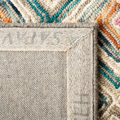Handmade Geometric Tufted Wool Area Rug in Green/Red - 4' x 6'