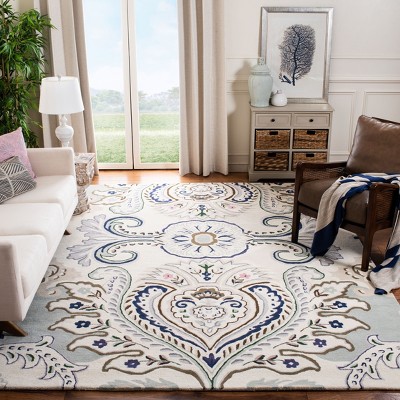 Ivory and Blue Hand-Tufted Wool 9' x 12' Area Rug