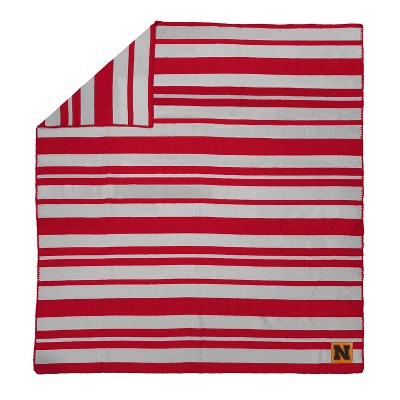 NCAA Nebraska Cornhuskers Acrylic Stripe Throw Blanket with Faux Leather Logo Patch