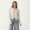 Anna-Kaci Women's Soft Knit Button Front Cropped Cardigan with Ribbed Trim Details and Relaxed Long Sleeves - 2 of 4