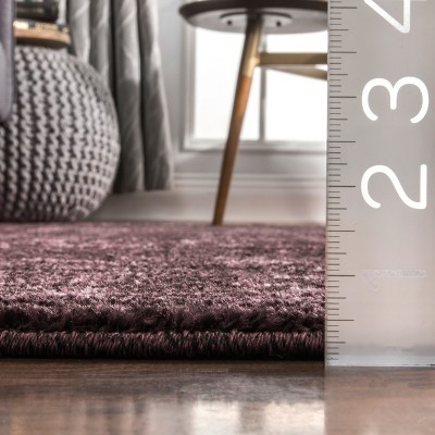 Elegant Vintage Burgundy Synthetic 7'6" x 9'6" Area Rug