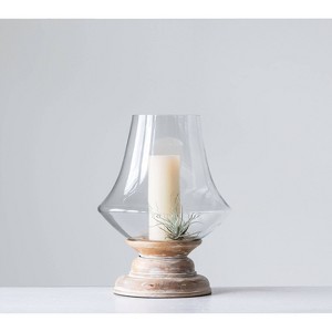 Storied Home 16" x 13" Glass Hurricane Candle Holder with Mango Wood Base Natural/Clear - Pillar Candle Compatibility, Tabletop Display - 1 of 4