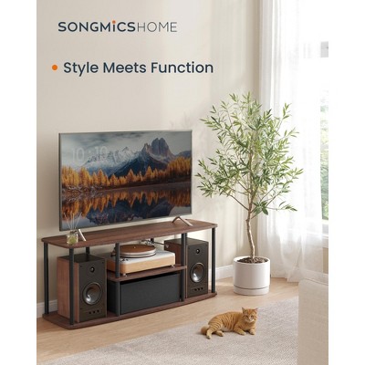 TV Stand for up to 50-inch TVs.Toolless assembly. Measuring 43 x 14 x 18 inches, it's a media center table with shelves.