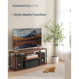 TV Stand for up to 50-inch TVs.Toolless assembly. Measuring 43 x 14 x 18 inches, it's a media center table with shelves. - 1 of 4