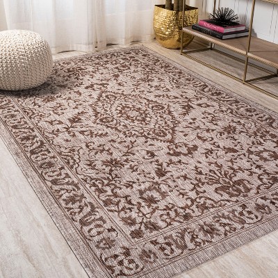 Ivory and Brown Medallion 8' x 10' Synthetic Rug