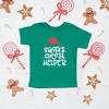 The Juniper Shop Santa's Cutest Helper Glitter Toddler Short Sleeve Tee - 3T - Kelly - 2 of 3