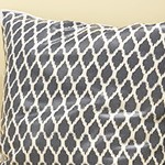 beige rattan/off-white cushion