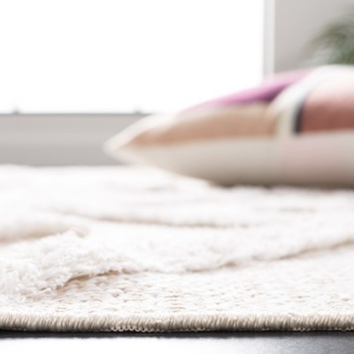 Beige and Ivory Geometric Flat Woven Synthetic Rug 5' x 7'