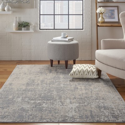 Ivory Abstract Power-Loomed Synthetic 5'3" x 7'3" Area Rug