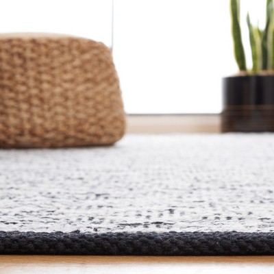 Ebony Black and Ivory Flat Woven Wool Area Rug 3' x 5'