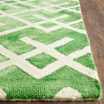 Hand-Tufted Green and Ivory Wool Area Rug, 5' x 8'
