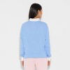 Women's Hello Kitty & Friends Polo Graphic T-Shirt - Light Blue - 3 of 3