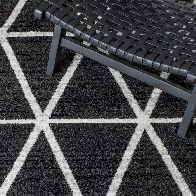 Black and Ivory Geometric Synthetic Area Rug