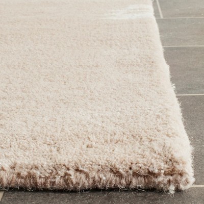 Sand and Ivory Floral Hand-Tufted Wool 6' x 9' Area Rug