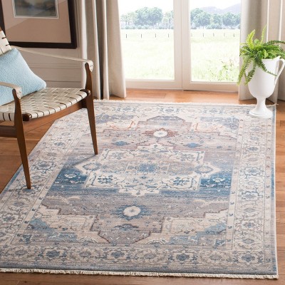 Vintage Blue and Gray Rectangular 6' x 9' Synthetic Area Rug