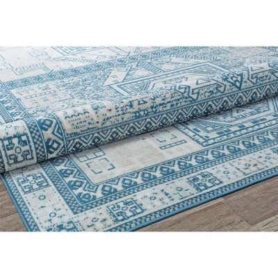 Azure Elegance 5' x 7' Reversible Blue Synthetic Area Rug