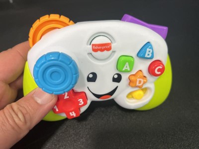 Fisher-Price Laugh & Learn Baby & Toddler Toy Game & Learn Controller  Pretend Video Game with Music Lights & Activities Ages 6+ Months