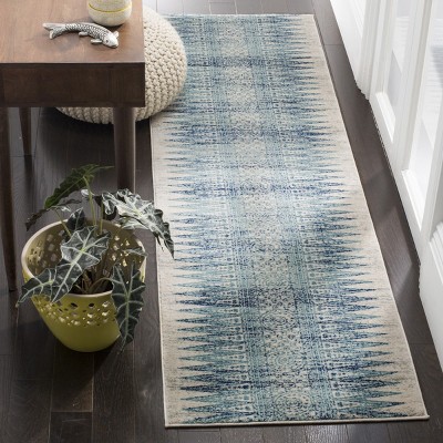 Ivory and Turquoise High Pile Synthetic Area Rug