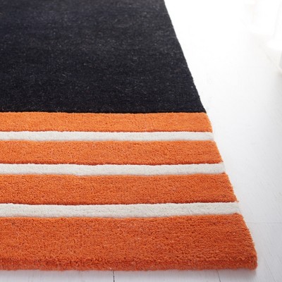 Ivory and Rust Hand-Tufted Wool Abstract 6' x 9' Area Rug