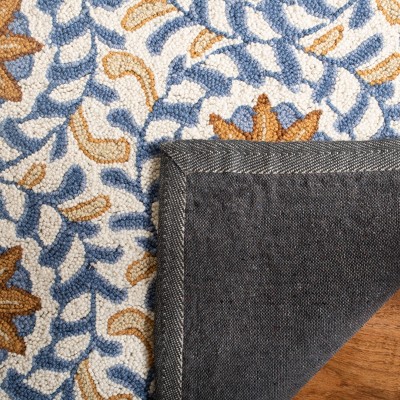 Ivory and Blue Hand-Knotted Wool Floral Oval Rug