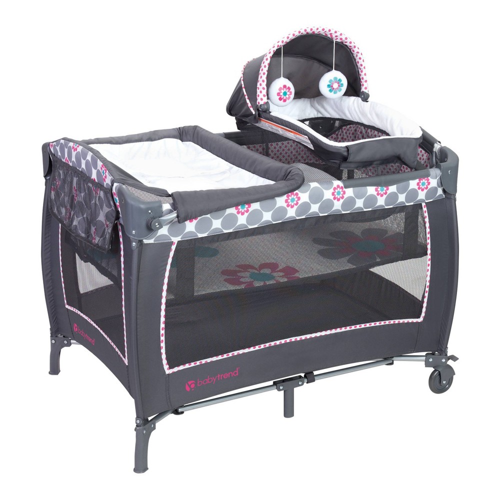 Baby Trend Lil Snooze Deluxe II Nursery Center - Daisy Dots: Bassinet, Locking Wheels, Changing Table
