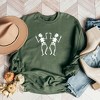 Simply Sage Market Women's Graphic Sweatshirt Two Dancing Skeletons - 2 of 2
