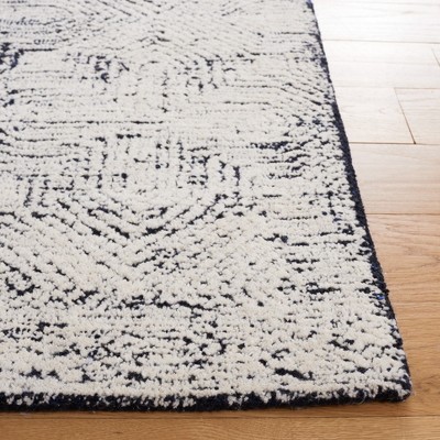 Metro Black and Ivory Hand-Tufted Wool Area Rug 8' x 10'