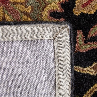 Hand-Tufted Oval Navy and Red Wool Accent Rug