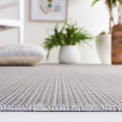 Gray 5'1" x 7'6" Synthetic Rectangular Area Rug