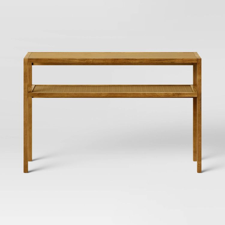 A rectangular wooden console table with a lower shelf and four legs.