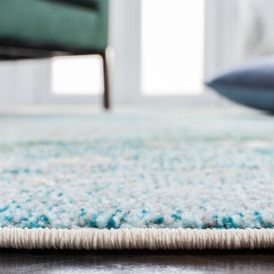 Light Blue and Green Abstract Distressed 6' x 9' Rug