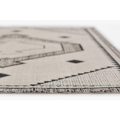 Noho Black and Ivory Synthetic Rectangular Rug 5'3" x 7'6"