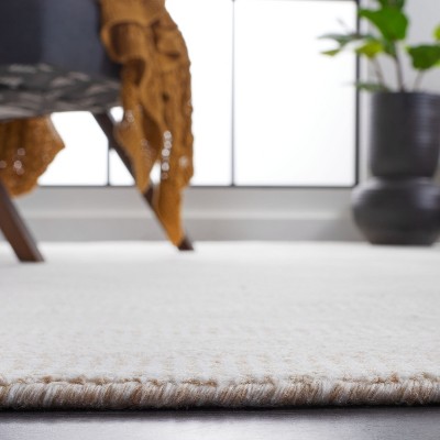 Beige and Ivory Hand Loomed Viscose 4' x 6' Area Rug
