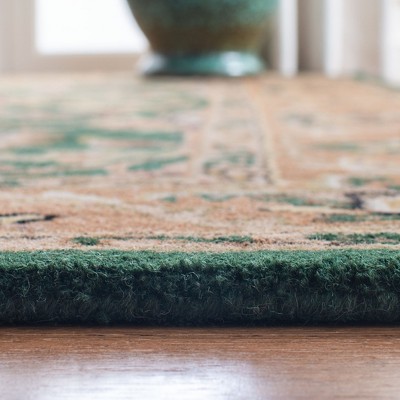 Handmade Dark Green and Gold Oval Wool Area Rug