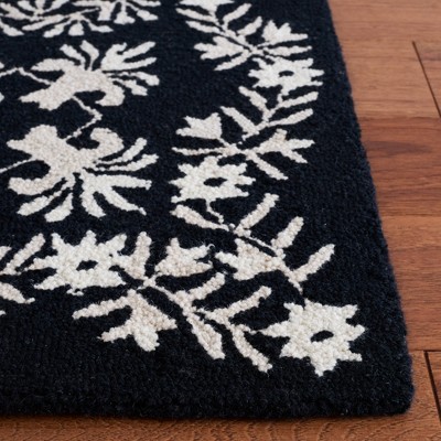 Empire Black and Ivory Hand-Tufted Wool Area Rug