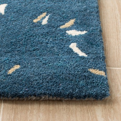 Blue Floral 5' x 8' Handmade Wool and Viscose Area Rug